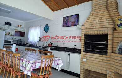 Imagem: A casa possui 5 Dormitórios, 5 Banheiros, 2 Vagas na garagem