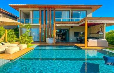 Imagem: A casa em condomínio possui 5 Dormitórios, 5 Banheiros, 4