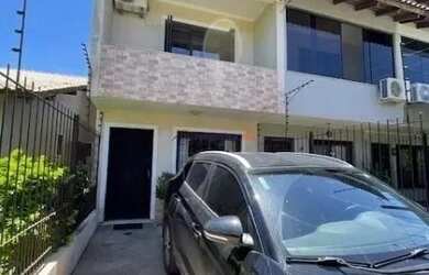 Imagem: A casa possui 3 Dormitórios, 3 Banheiros, 1 Vaga na garagem