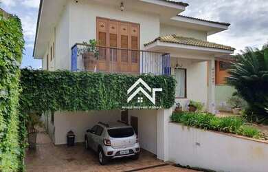 Imagem: A casa possui 3 Dormitórios, 4 Banheiros, 4 Vagas na garagem