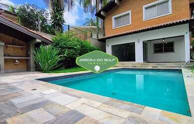 Imagem: A casa possui 4 Dormitórios, 5 Banheiros, 3 Vagas na garagem