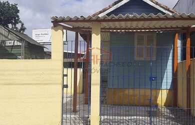 Imagem: A casa possui 2 Dormitórios, 1 Banheiro, 1 Vaga na garagem