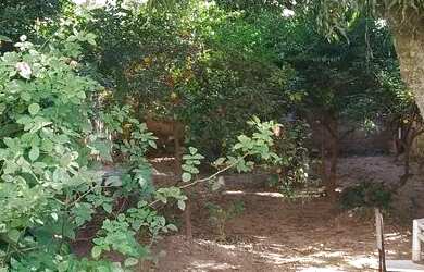 Imagem: A casa possui 2 Dormitórios, 1 Banheiro, 2 Vagas na garagem