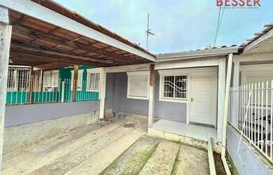 Imagem: A casa possui 2 Dormitórios, 1 Banheiro, 1 Vaga na garagem