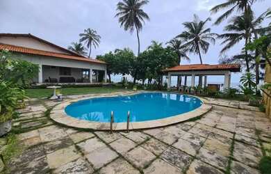 Imagem: A casa possui 4 Dormitórios, 5 Banheiros, 5 Vagas na garagem