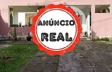 Imagem: A casa possui 4 Dormitórios, 4 Banheiros, 4 Vagas na garagem