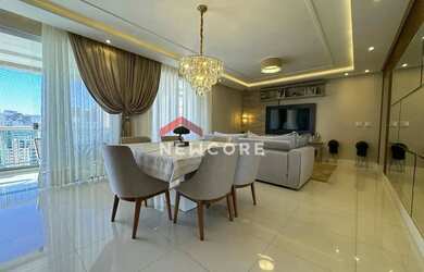 Imagem: O apartamento possui 4 Dormitórios, 5 Banheiros, 2 Vagas na