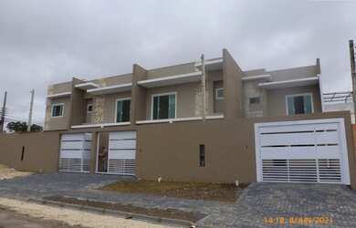 Imagem: A casa possui 3 Dormitórios, 3 Banheiros, 3 Vagas na garagem