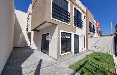 Imagem: A casa possui 3 Dormitórios, 3 Banheiros, 2 Vagas na garagem