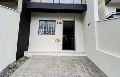 Imagem: A casa possui 2 Dormitórios, 2 Banheiros, 1 Vaga na garagem