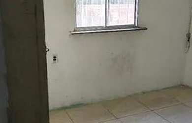 Imagem: A casa possui 2 Dormitórios e 1 Banheiro e está localizado