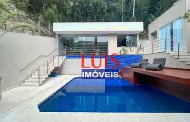 Imagem: A casa em condomínio possui 5 Dormitórios, 5 Banheiros, 4