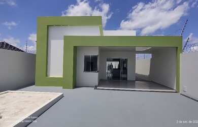 Imagem: A casa possui 3 Dormitórios, 2 Banheiros, 2 Vagas na garagem