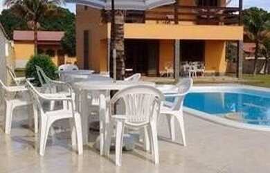 Imagem: A casa possui 5 Dormitórios, 3 Banheiros, 3 Vagas na garagem