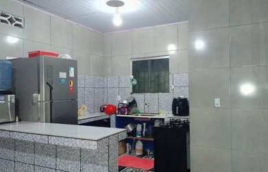 Imagem: A casa possui 3 Dormitórios, 2 Banheiros e está localizado