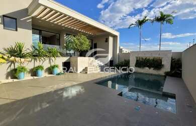 Imagem: A casa possui 3 Dormitórios, 4 Banheiros, 4 Vagas na garagem