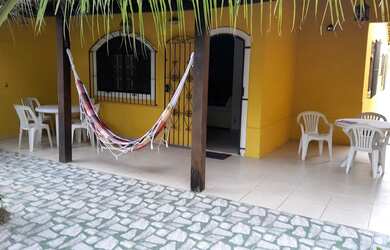 Imagem: A casa possui 2 Dormitórios, Acomodam 6 pessoas, 1 Vaga na