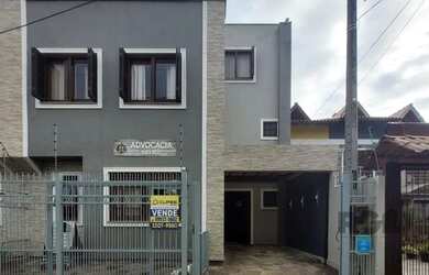 Imagem: A casa possui 2 Dormitórios, 3 Banheiros, 1 Vaga na garagem