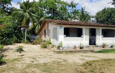 Imagem: A casa possui 3 Dormitórios, 2 Banheiros e está localizado