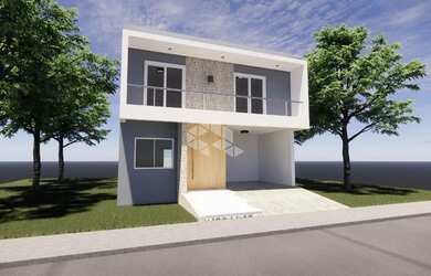 Imagem: A casa possui 3 Dormitórios, 2 Banheiros, 2 Vagas na garagem