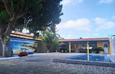 Imagem: A casa possui 5 Dormitórios, 5 Vagas na garagem e está localizado