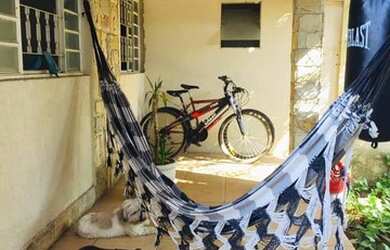 Imagem: A casa possui 3 Dormitórios, 3 Banheiros, 2 Vagas na garagem