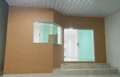 Imagem: A casa possui 3 Dormitórios, 2 Banheiros, 2 Vagas na garagem