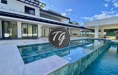 Imagem: A casa em condomínio possui 5 Dormitórios, 5 Banheiros, 5