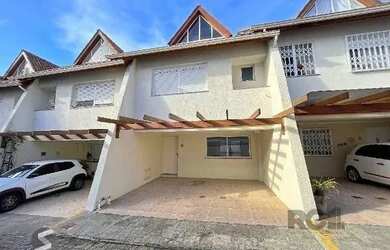 Imagem: A casa em condomínio possui 3 Dormitórios, 3 Banheiros, 2