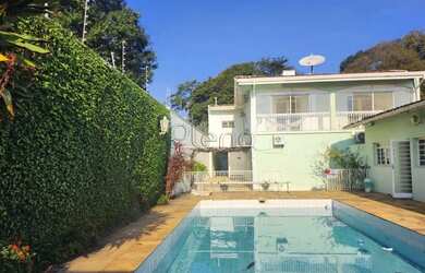 Imagem: A casa possui 5 Dormitórios, 5 Banheiros, 5 Vagas na garagem