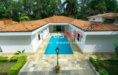 Imagem: A casa possui 4 Dormitórios, 5 Banheiros, 5 Vagas na garagem