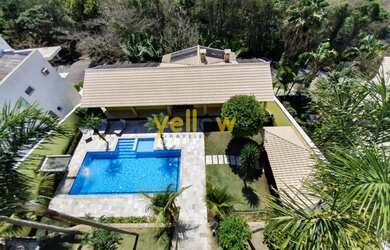 Imagem: A casa em condomínio possui 5 Dormitórios, 5 Banheiros, 5