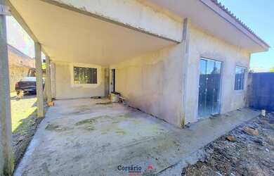 Imagem: A casa possui 2 Dormitórios, 2 Banheiros, 1 Vaga na garagem