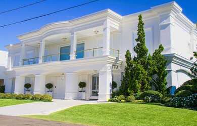 Imagem: A casa em condomínio possui 5 Dormitórios, 5 Banheiros, 4