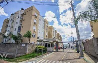 Imagem: O apartamento possui 3 Dormitórios, 1 Banheiro, 2 Vagas na