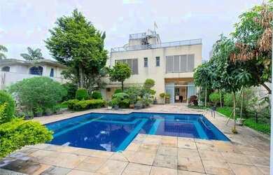 Imagem: A casa em condomínio possui 4 Dormitórios, 5 Banheiros, 5