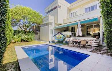 Imagem: A casa em condomínio possui 4 Dormitórios, 5 Banheiros, 4