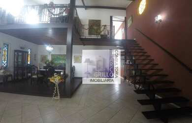 Imagem: A casa em condomínio possui 5 Dormitórios, 5 Banheiros, 5