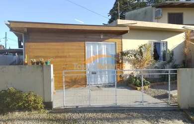 Imagem: A casa possui 1 Dormitório, 1 Banheiro, 1 Vaga na garagem