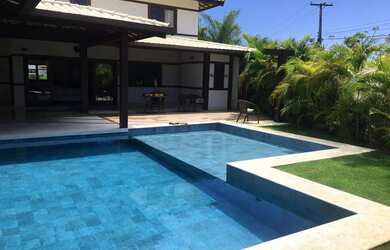 Imagem: A casa possui 5 Dormitórios, 4 Banheiros, 230m² de Área e