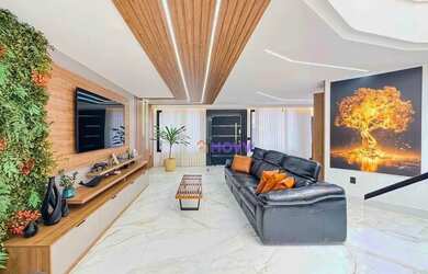 Imagem: A casa possui 3 Dormitórios, 5 Banheiros, 5 Vagas na garagem