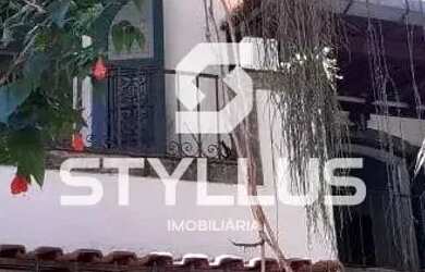 Imagem: A casa possui 4 Dormitórios, 5 Banheiros, 2 Vagas na garagem