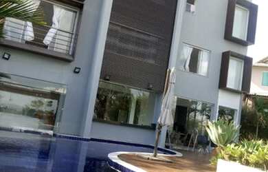 Imagem: A casa em condomínio possui 5 Dormitórios, 2 Banheiros, 4