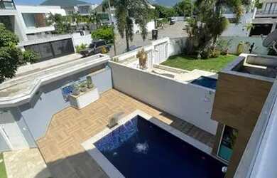 Imagem: A casa em condomínio possui 4 Dormitórios, 5 Banheiros, 2