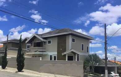 Imagem: A casa em condomínio possui 4 Dormitórios, 3 Banheiros, 2