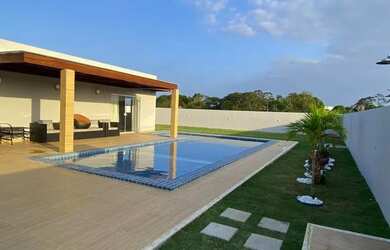 Imagem: A casa em condomínio possui 4 Dormitórios, 5 Banheiros, 5