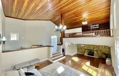 Imagem: A casa possui 3 Dormitórios, 5 Banheiros, 5 Vagas na garagem