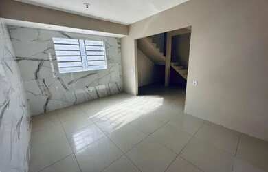 Imagem: A casa possui 2 Dormitórios, 2 Banheiros, 4 Vagas na garagem