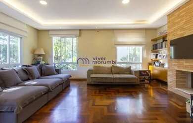 Imagem: A casa possui 3 Dormitórios, 5 Banheiros, 4 Vagas na garagem