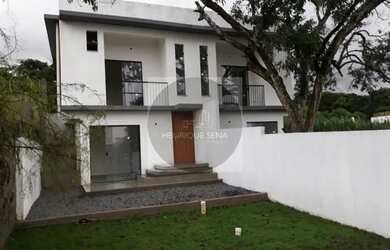 Imagem: A casa possui 3 Dormitórios, 3 Banheiros, 1 Vaga na garagem